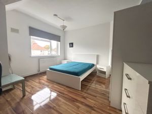 Bedroom One- click for photo gallery